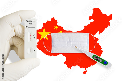 Flag of China with face mask, positive covid test and thermometer. Zero covid in China. Covid 19 outbreak in China.