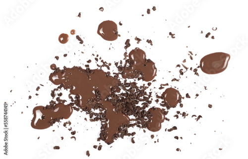 Spilled chocolate milk puddle with chopped, milled dark chocolate isolated on white background, top view