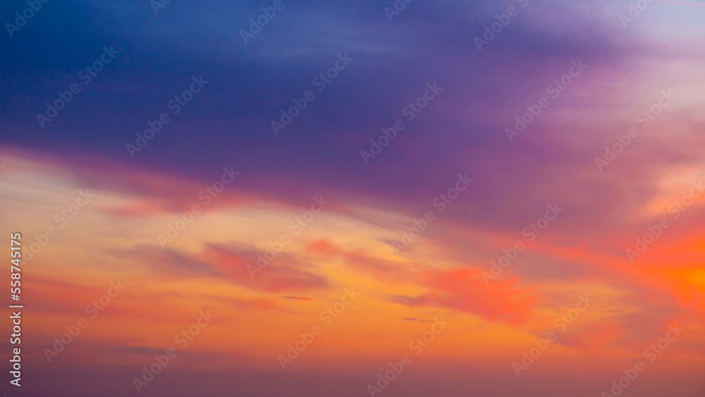  Beautiful sunset sky with amazing colorful clouds against deep blue