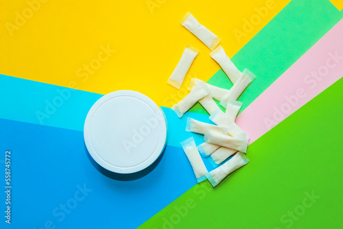 Snus pads, nicotine spiders on a paper background, the concept of a bad habit. photo