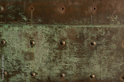 rusty metal green background. closeup photo