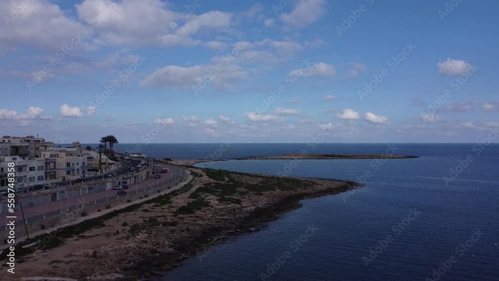 Malta Island, Qawra, cinematic aerial view of the coastline midday. High quality FullHD footage Malta Island, Qawra, cinematic aerial view of the coastline midday. High quality FullHD footage