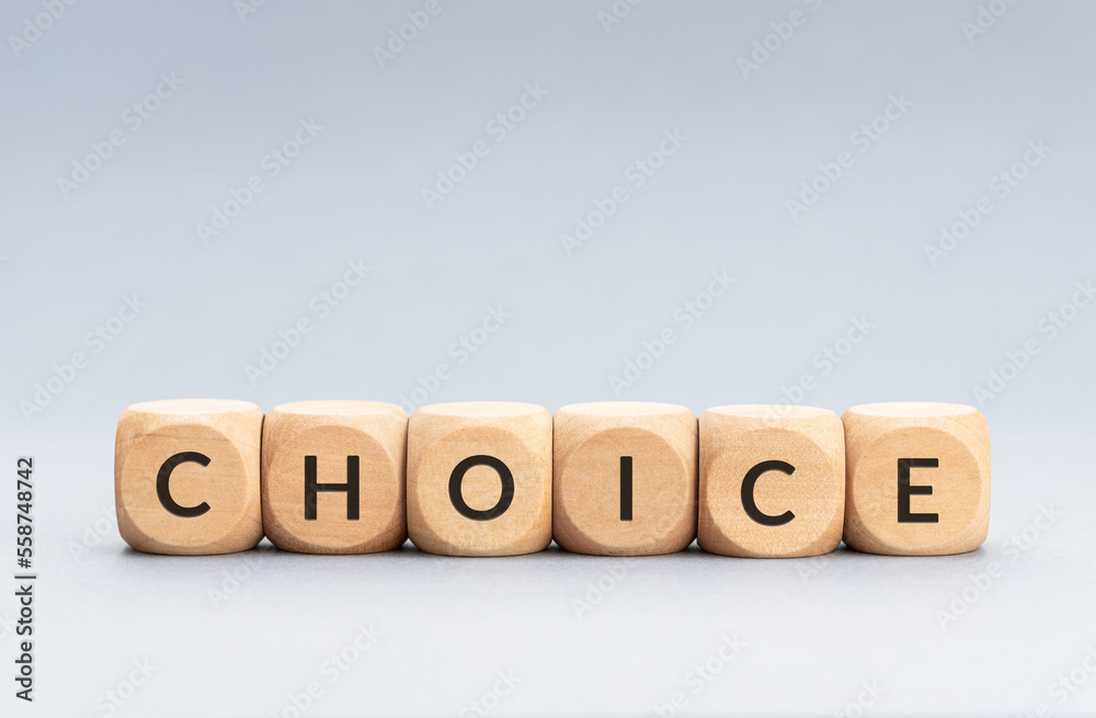 Choice word on wooden blocks on gray background. Copy space Choice word on wooden blocks on gray background. Copy space