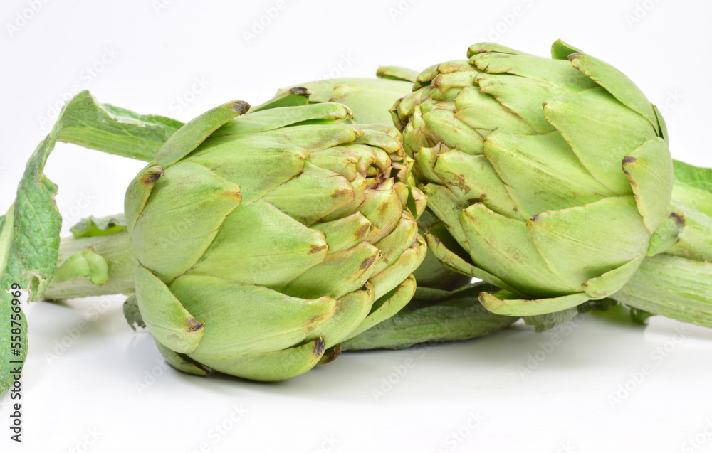 Fototapeta premium Close up, group artichokes, light background and copy space.