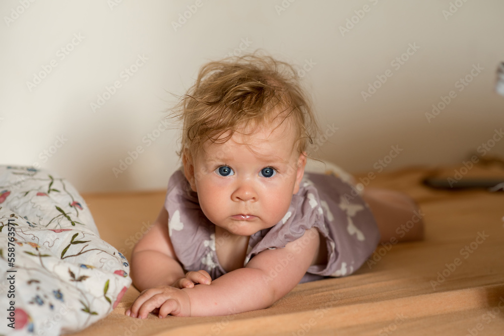 child playing on the floor child playing on the floor