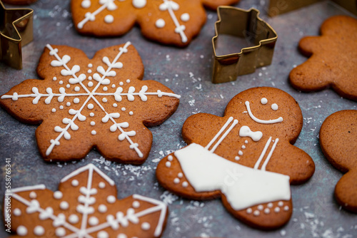Gingerbread man and other christmas cookies closeup