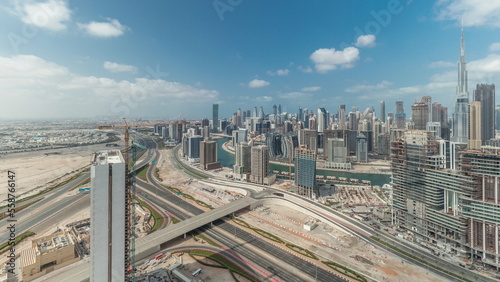 Panorama showing skyline of Dubai with business bay and downtown district timelapse. photo