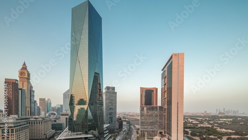 Dubai International Financial district aerial day to night timelapse. Panoramic view of business and financial office towers. © neiezhmakov