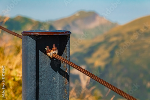 Details of a steel fence at the famous Walmendinger Horn summit, Kleinwalsertal valley, Mittelberg, Vorarlberg, Austria photo