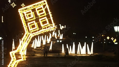 Beautiful European city is decorated before New Year celebration at night photo