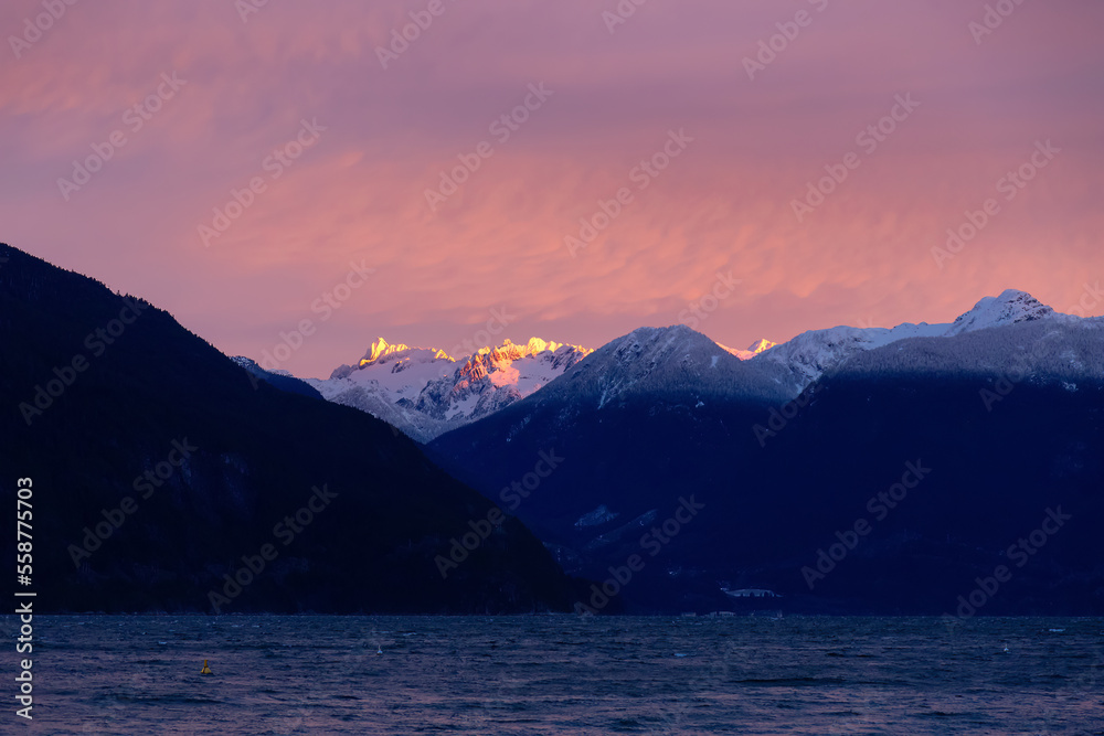 Canadian Mountain Landscape Nature Background. Howe Sound near Vancouver and Squamish, BC, Canada. Colorful winter Sunrise.