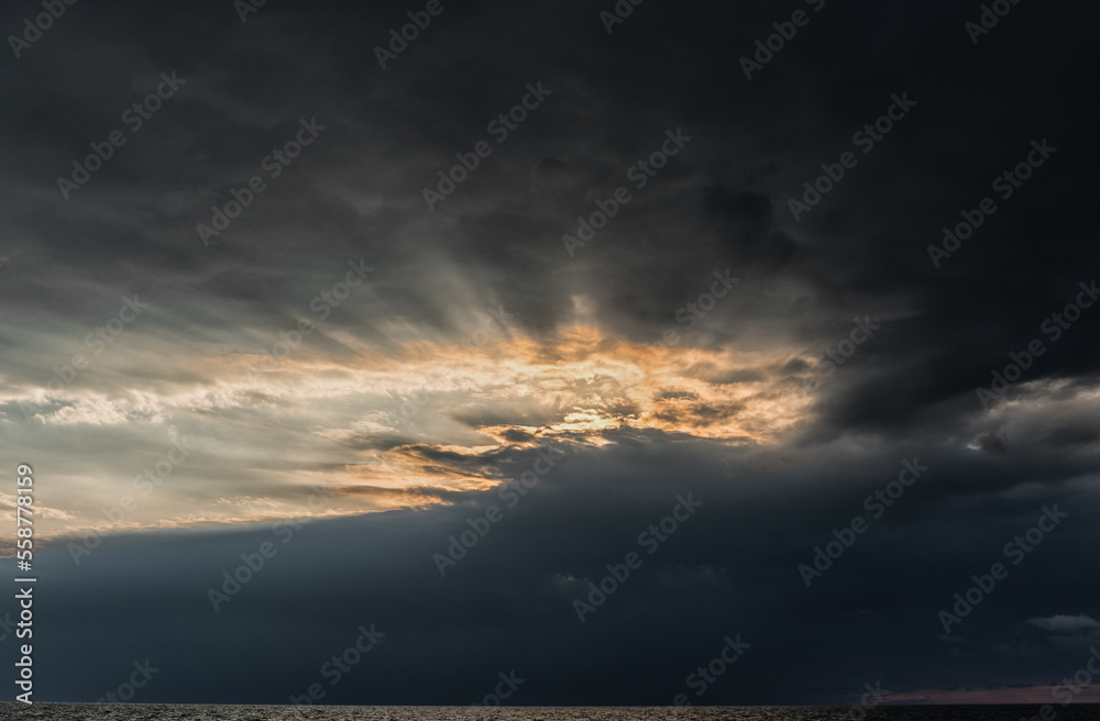 Cloudy Sky over the Baltic Sea in Latvia. Europe. Beautiful Evening Sunlight ever the Water.