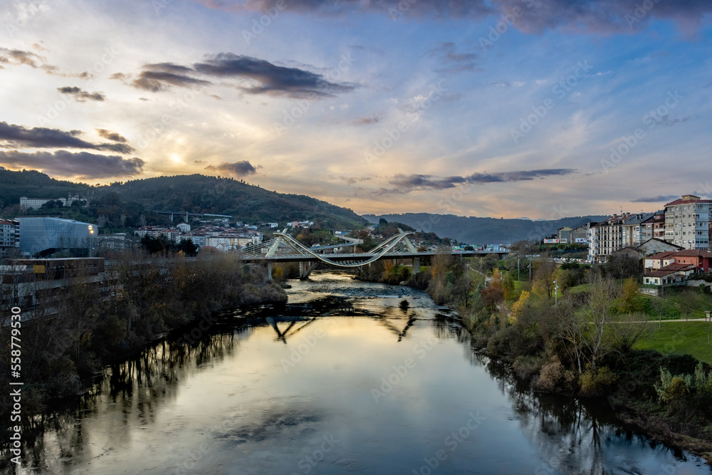 Ponte do milenio, Ourense. Landscape of the millenium bridge over Miño river a sunset, Ourense, Spain