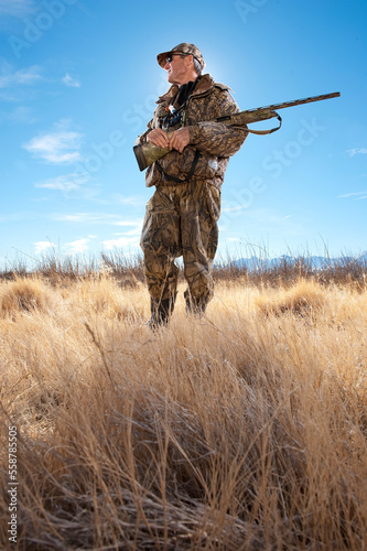A hunter poses with his shotgun in Nevada.