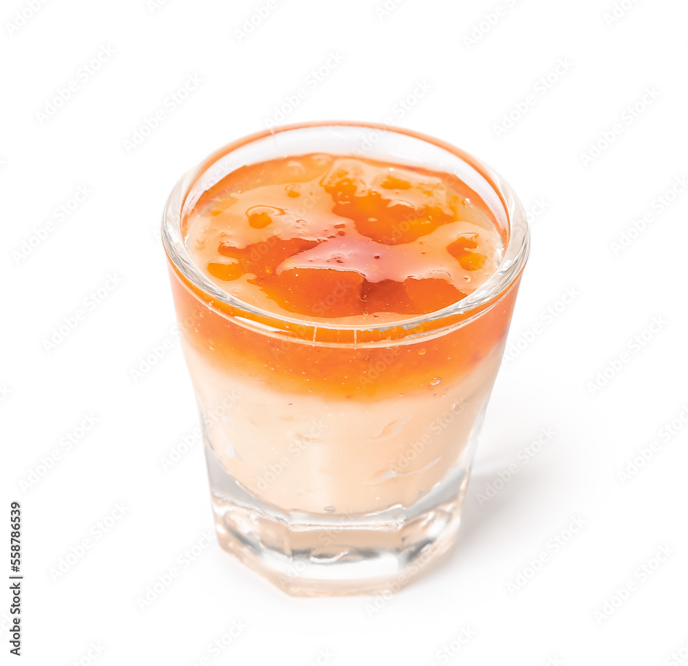 Shot of delicious vanilla pudding with jam isolated on white background Shot of delicious vanilla pudding with jam isolated on white background