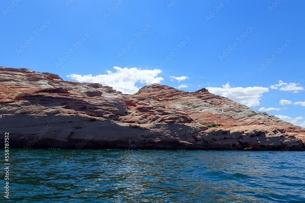 Colorful sandstone rock formations along the Colorado River at Glen Canyon National Recreation Area