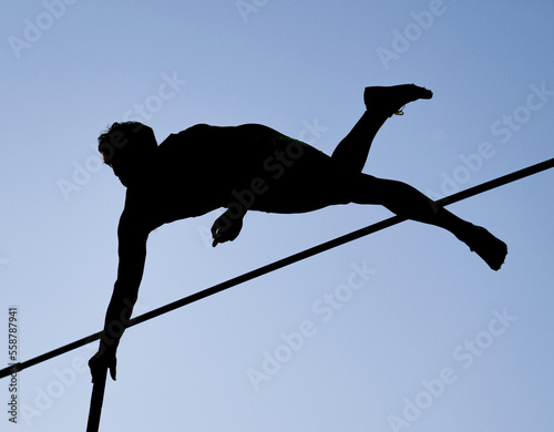 Illustration picture shows a pole vaulter (silhouette) jumping 