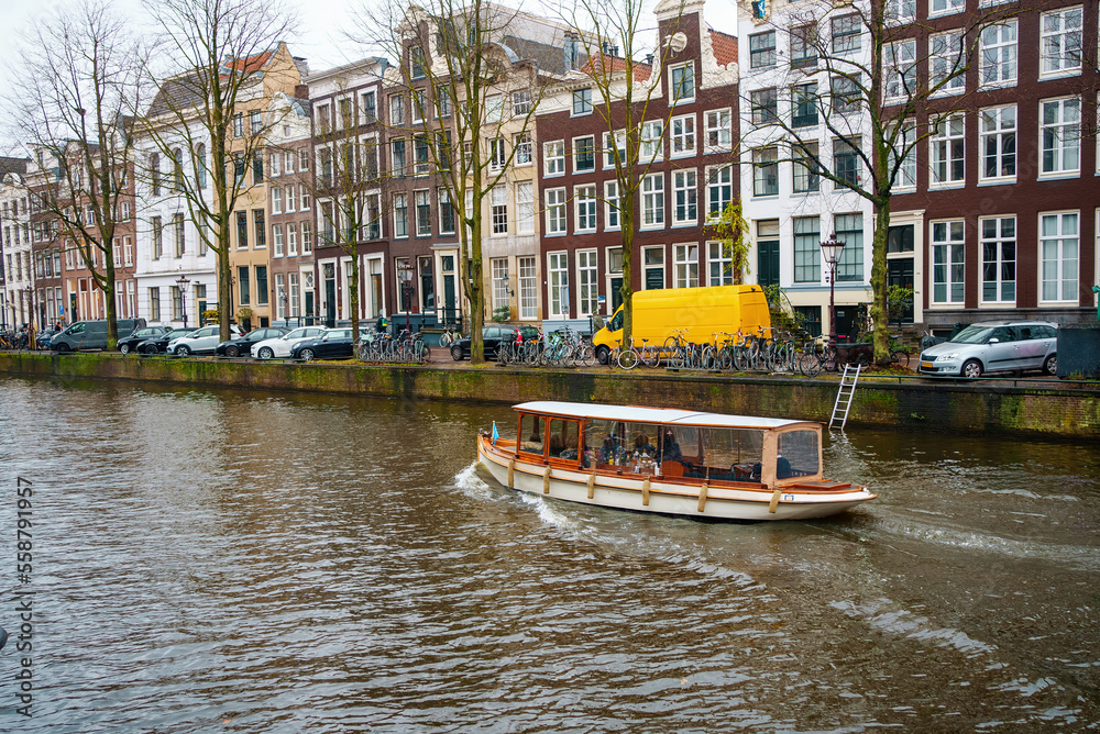 Channel in Amsterdam Netherlands houses river Amstel landmark old european city landscape