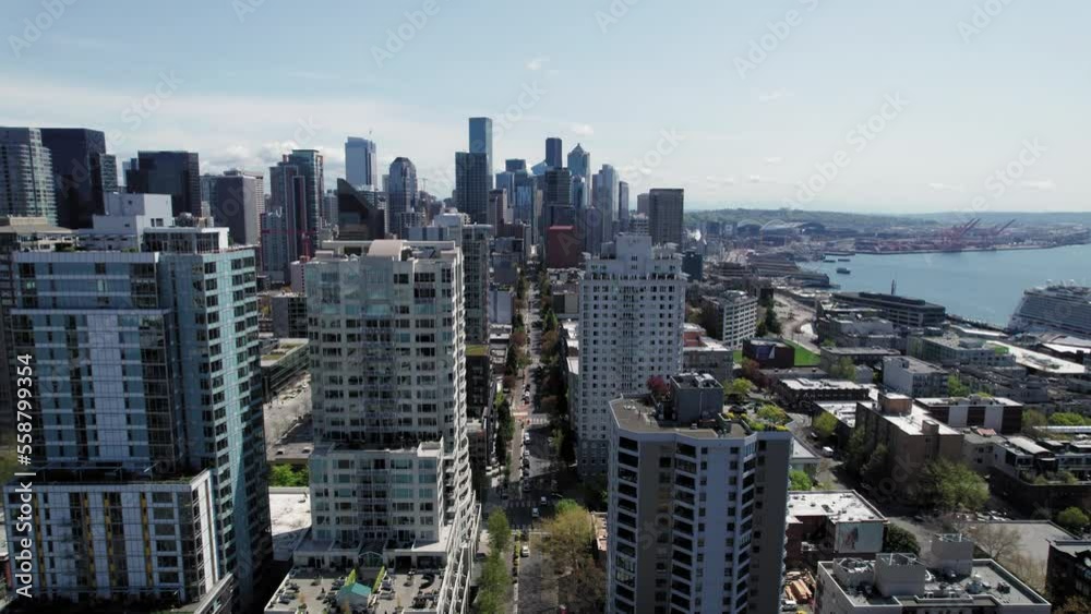 Aerial Over Downtown Seattle Street Leading to Skyscraper Buildings Aerial Over Downtown Seattle Street Leading to Skyscraper Buildings