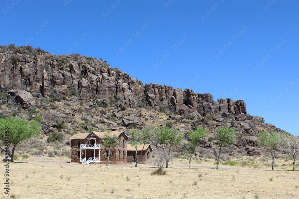 Old building with a mountain behind it at Fort Davis National Historic Site in Texas