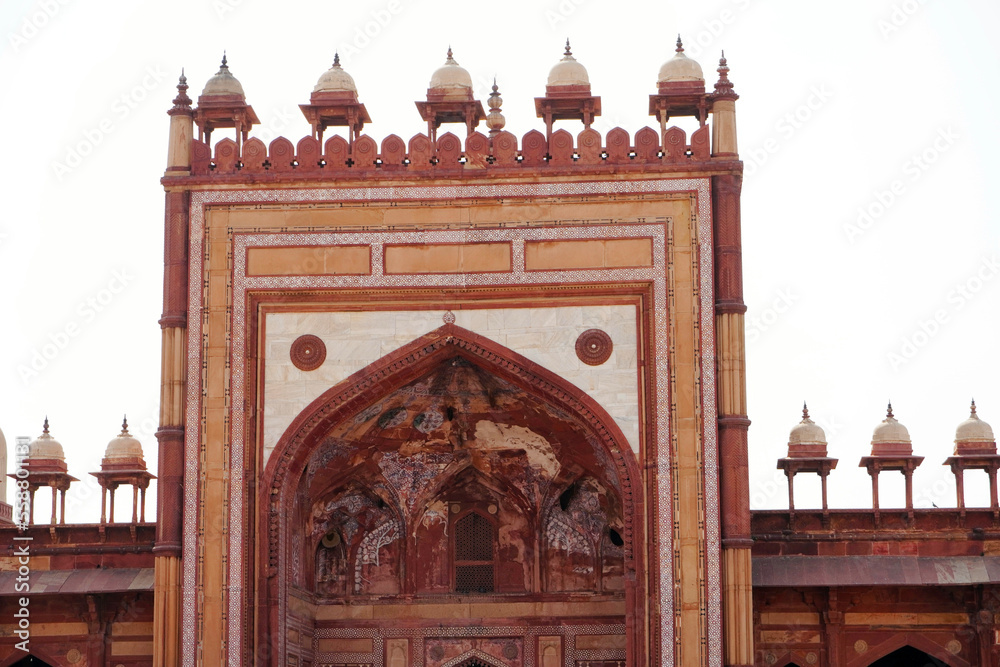 Medieval red sandstone gateway known as the Buland Darwaza at Fatehpur Sikri, Agra, India.