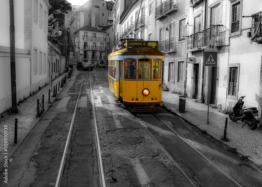 Black and white background of the yellow street car on the streets of Lisbon, Portugal