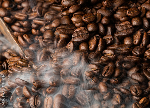 coffee beans background with steam 