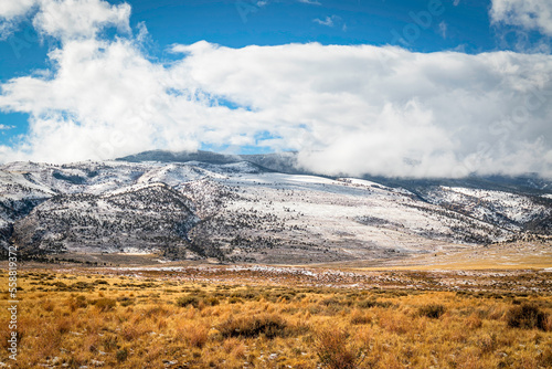 Rattlesnake Mountain in winter snow high plain Wyoming sagebrush terrain