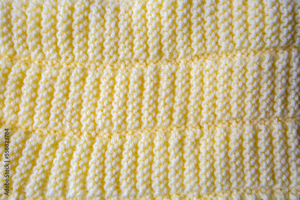 Knitted texture. Pattern fabric made of wool. Background, copy space. Handmade sweater texture, knitted wool pattern Knitted texture. Pattern fabric made of wool. Background, copy space. Handmade sweater texture, knitted wool pattern