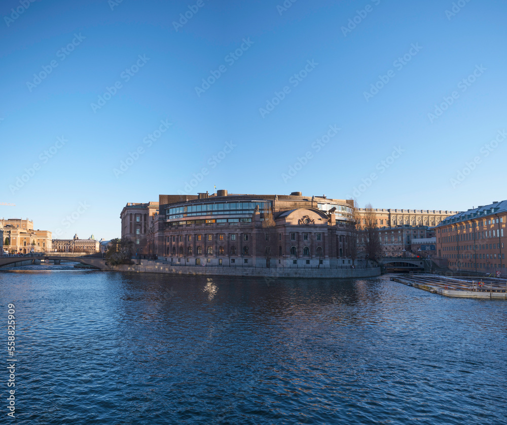 The government house at the canal Stallkanalen, a low winter solstice a sunny and snowy day in Stockholm
