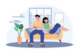 Young Couple Sitting On The Sofa Playing A Game