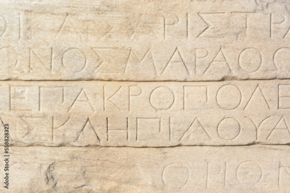 Ancient Greek inscription on marble in the Acropolis of Athens Ancient Greek inscription on marble in the Acropolis of Athens