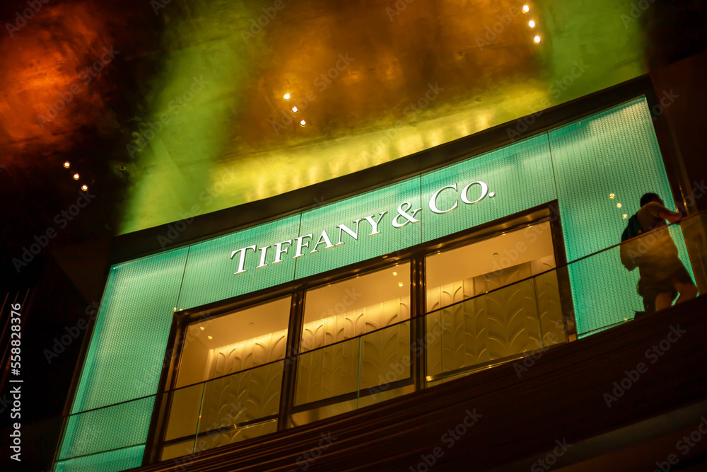 Bangkok Icon siam, December 24th 2022- Tiffany Co. shop front in the icon  siam centre mall at night, Tiffany is a high-end retailer carrying luxury  brands apparel, handbags and other accessories. Photos