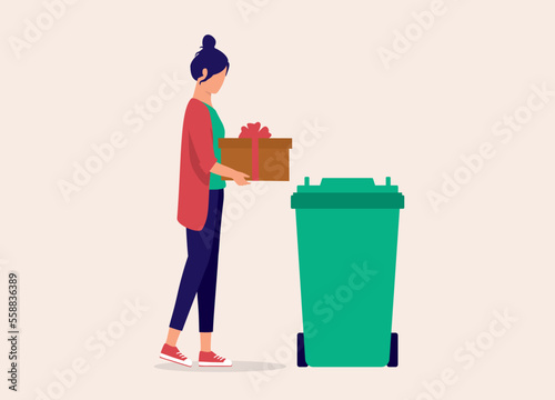 One Young Woman Throwing Away Her Gift Into The Garbage Bin. Full Length. Flat Design Style, Character, Cartoon. photo