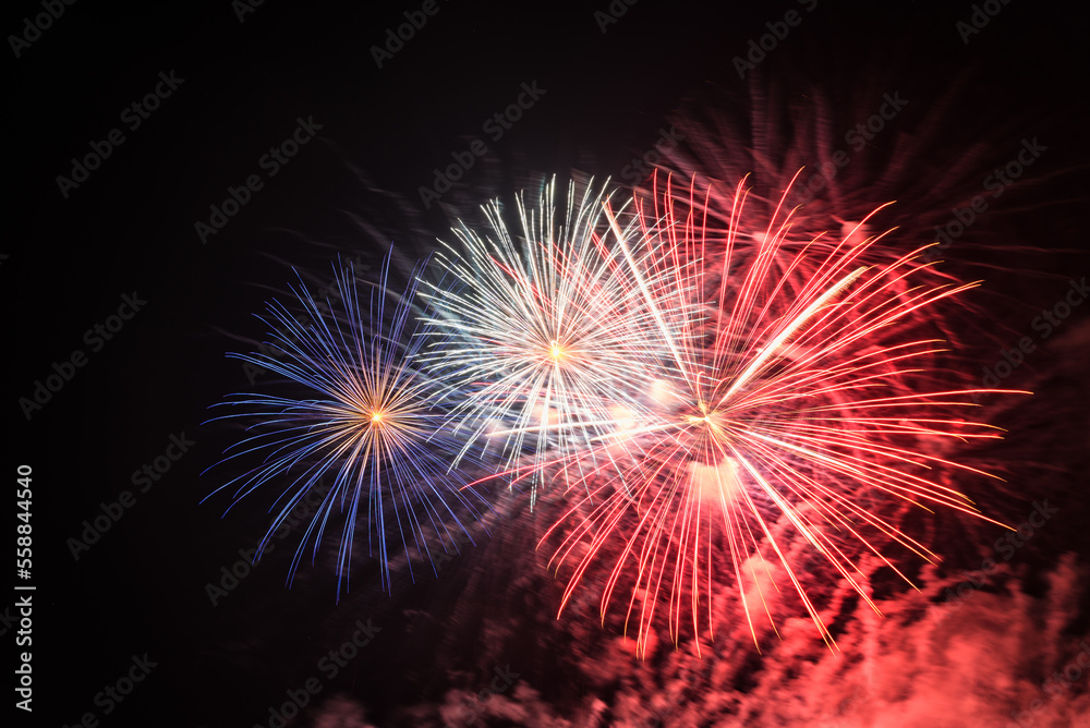 Colorful firework with bokeh background. New Year celebration, Abstract holiday background. Fireworks at Night. Abstract background for celebration