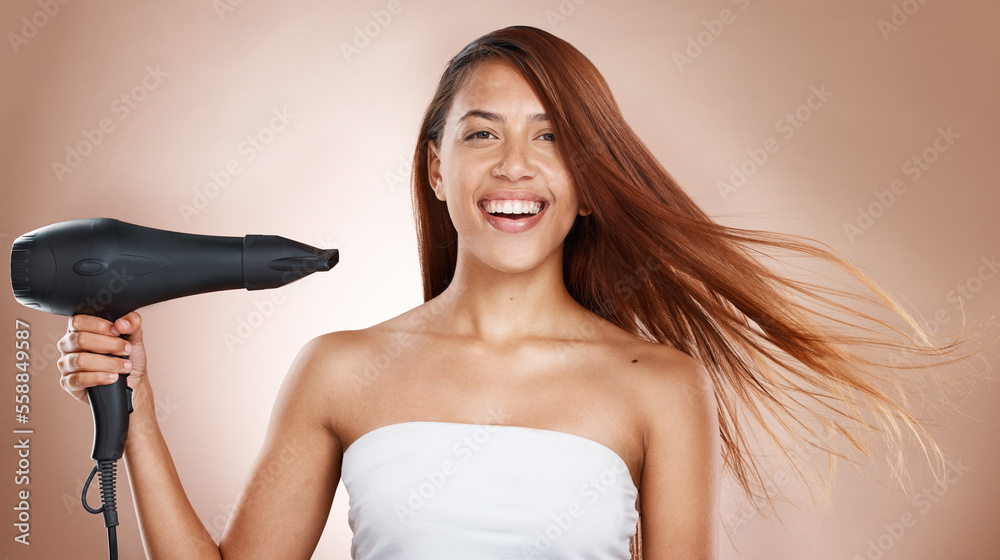 Hair care, beauty and cosmetics of a woman with hairdryer on studio background for luxury keratin treatment with shampoo product. Headshot of female posing for salon, hairdresser and wellness mockup Hair care, beauty and cosmetics of a woman with hairdryer on studio background for luxury keratin treatment with shampoo product. Headshot of female posing for salon, hairdresser and wellness mockup