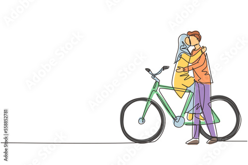 Continuous one line drawing young loving Arabian couple sitting on bicycle and kissing. Romantic human relations, love story, newlywed family in honeymoon traveling adventure. Single line draw design