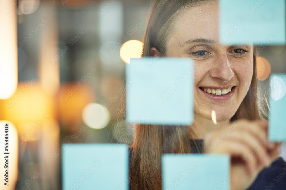 Planning, strategy and woman writing on glass wall sticky note, brainstorming idea for creative startup agency. Market research, goals and target ideas, designer at workshop with mindmap for business Planning, strategy and woman writing on glass wall sticky note, brainstorming idea for creative startup agency. Market research, goals and target ideas, designer at workshop with mindmap for business