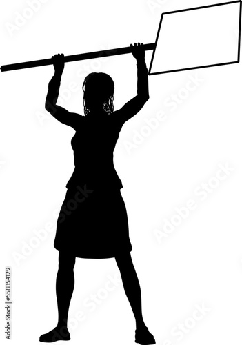 Protestor or demonstrator at a demonstration march, picket line or strike protest rally in silhouette. Holding up a banner or picket sign board placard.