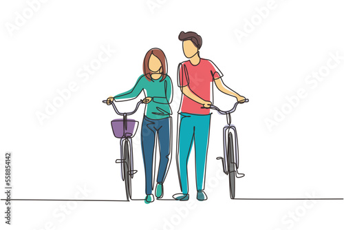 Single continuous line drawing cyclists walking down forest road with their bicycles on summer day. Young man and woman in love. Happy romantic married couple. One line draw graphic design vector
