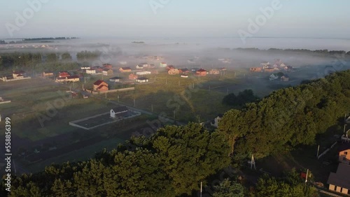 Rural aerial view, fogy morning sunrise.