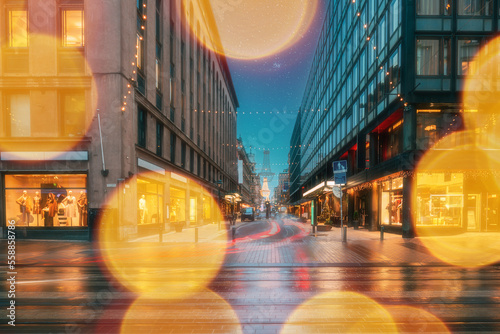 Helsinki, Finland. Effect Bokeh Abstract Bright Blue Sky. New Year Lights Xmas Christmas Decorations And Festive Illumination. Winter Christmas Holiday Season. Evening Illumination Boke Blured View. photo