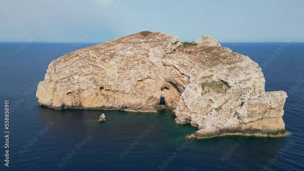 Isola di Foradada Island at Capo Caccia, Alghero Bay, Sardinia, Italy - 4k Aerial Circling Isola di Foradada Island at Capo Caccia, Alghero Bay, Sardinia, Italy - 4k Aerial Circling