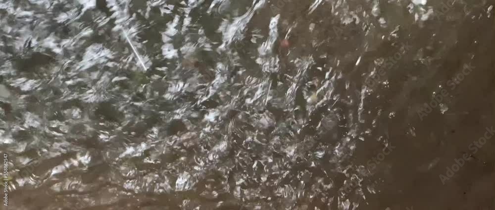 overflow of rainwater in front of the house when it rains heavily overflow of rainwater in front of the house when it rains heavily