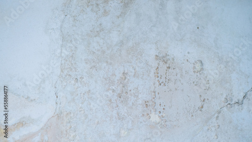 Rain water leaks on the wall causing damage and peeling paint