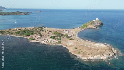 Nora Peninsula and Archeological site with ancient Roman ruins in Sardinia, Italy - Aerial photo