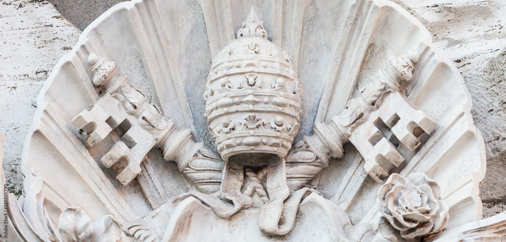 Vatican State symbol - two crossed keys and a tiara, Vatican City State. Vatican State symbol - two crossed keys and a tiara, Vatican City State.
