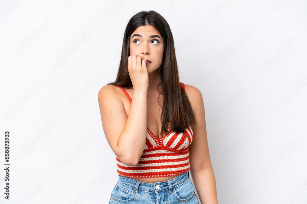 Young Brazilian woman isolated on white background is a little bit nervous Young Brazilian woman isolated on white background is a little bit nervous