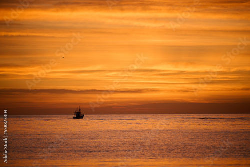 boat at sunset © Lari