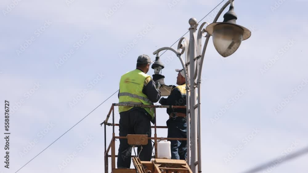 diode lights, Municipal worker, led lights. Workmen working on
